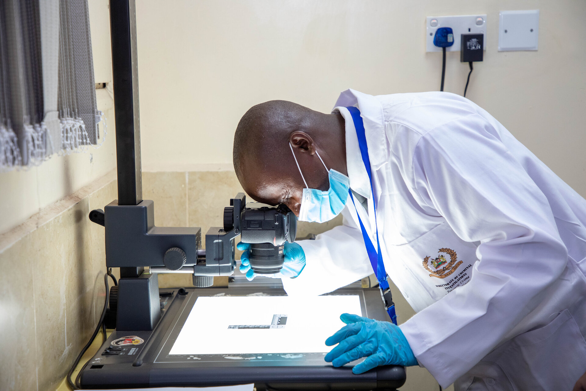 Scene of crime analysis by DCI officer.